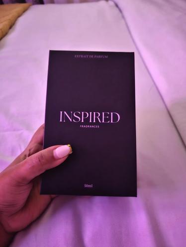 Elsa k260 holding her INSPIRED FRAGRANCES box
